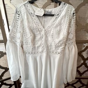 Long sleeve white mini dress 🤍 Perfect for a bridal shower or bachelorette